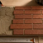 Brique pour mur intérieur rouge, grise ou sable rosé, pose sur table